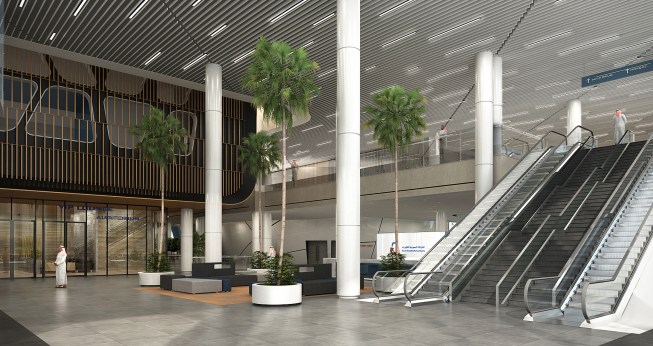Within the central podium building, the double-height reception lobby connects the auditorium, media center, exhibition space, prayer hall, press room, and VIP lounge. 