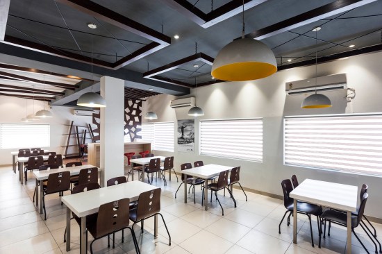 The design grew organically with unused ply boards utilized as partitions and storage shelves.