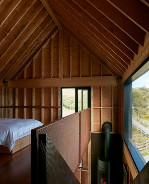 Bedroom, with view of perforated Cor-Ten stair detail