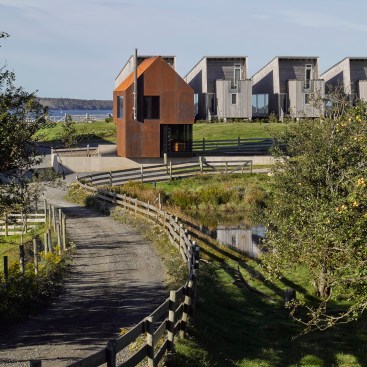 View from northeast, showing MacKay-Lyons Sweetapple Architects–designed cottages beyond