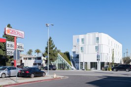 A Hydrotech green roof system covers the retail and community pavilion at the front of the site.