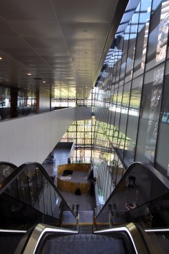 Vertical circulation wraps central gallery spaces on the upper levels. 