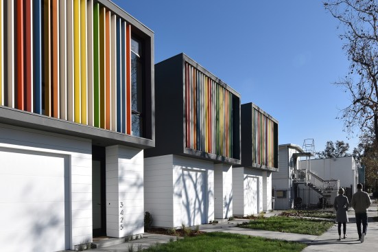 Colorful aluminum fins front 2nd Avenue on the site’s south side.