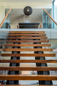 Walker Road modern home floating wood stairs