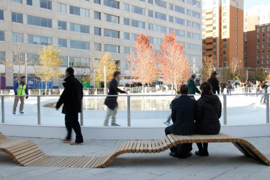 Reclaimed wood benches by the ice rink.