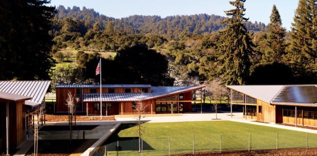 Three buildings—a town hall, a community hall, and a library—make up the new Portola Valley Town Center, a sustainable civic center for a small town south of San Francisco. Green measures include solar panels on the south-facing roof slopes of two of the buildings and a maintenance shed. Together they form a 76-kilowatt array that will help ease the energy load of the complex.