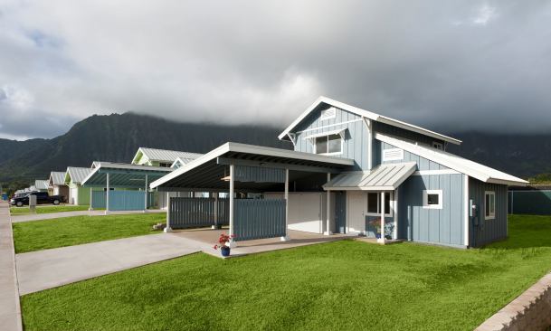 The architecture takes cues from mainland plantation-style homes of the 1920s and '30s, which were often retrofitted with awnings and carports. Rebar-reinforced driveways hold up to heavy trucks and boats.