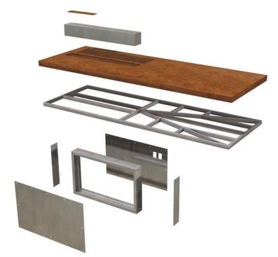 The house's main level comes together around a custom island, which serves both the kitchen and the dining area. SkB Architects designed the island's blackened steel base and cantilevered frame, heartwood oak tabletop, and long steel storage box.