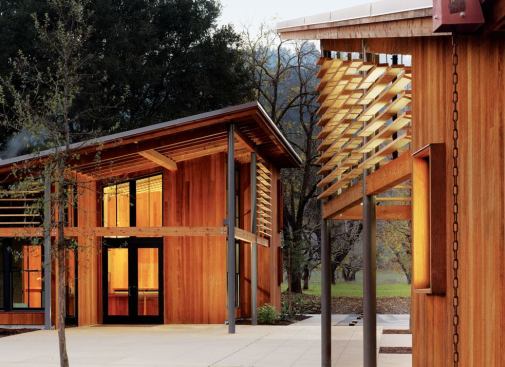 Each of the canted roofs of the three main structures is engineered to have one low point where rainwater will run off. Chain rainwater leaders take the place of gutters and manage the water runoff, which the architects hope will soon be able to be collected and diverted to a cistern. The rainwater would then be used to irrigate the playing fields and performance lawn, which will need ample water in a drought-prone region.