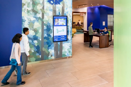 The south lobby welcomes visitors into a 3-story volume interior complemented with a large-scale artwork "Forest Sequence, 2019" by Elaine Coombs and Heather Patterson.