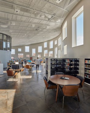 The library's ceiling is made from a semi-transparent expanded metal mesh.