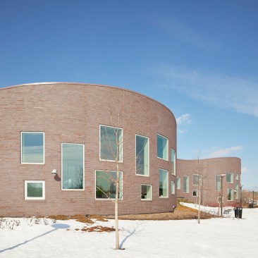 The scale of the building's windows are a nod to the surrounding rowhouses in the neighborhood.