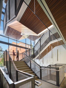 Featuring views, abundant daylight and a sense of openness, the central stair connects all building levels to promote pedestrian circulation and active dialogue. UO Tykeson Hall, OFFICE 52 Architecture, Design Architect.