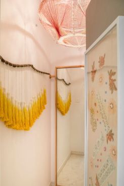 Salmon Pink Chandelier and yellow threads incorporating raw materials