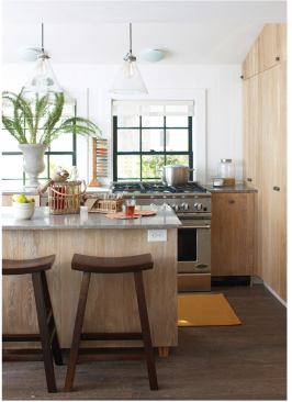 Modern convenience meets historic renovation in the kitchen where local stone countertops, Energy Star appliances, and efficient lighting bring new life to the space.