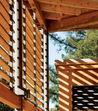 All three main buildings incorporate sunshades composed of 2x6 boards of reclaimed Alaskan yellow cedar from a salvage yard in the Pacific Northwest. The wood was chosen specifically because over time it will fade to a silver-gray color that will help reflect more light into the buildings’ interiors. The other timber sourced for the project, including 6x10 horizontal beams reclaimed from the school that used to occupy the site and redwood  cladding from McMullin Sawmill in Crescent City, Calif.—milled from dead and downed and beach-salvaged trees—will weather darker.