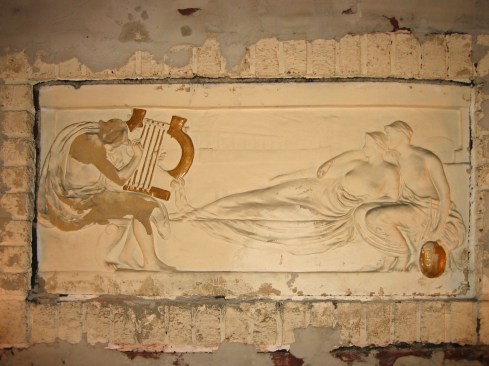 The original plaster frieze showed damage from being covered by drywall. Using acrylic, fabricator Ken Brooks set about repairing the frieze. 