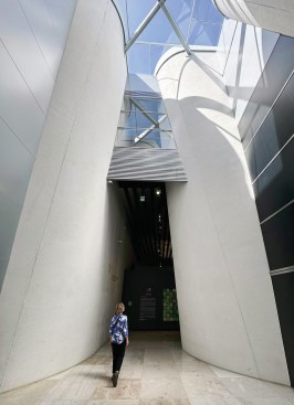A passageway between gallery spaces, with ample natural light.