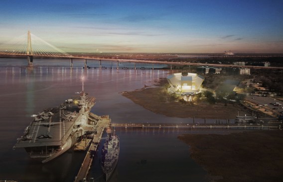 Night view of the National Medal of Honor Museum with the Ravenel Bridge.