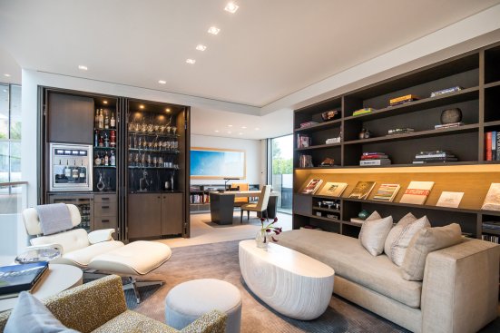 Luxury home office library and study with wet bar.