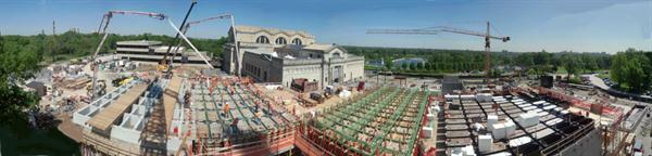 A+panorama+showing+the+pour+of+the+gridded+concrete+ceiling+slab+at+the+St.+Louis+Museum+of+Art+East+Wing.+From+left+to+right+are+sections+of+completed+coffers%3b+a+pour+in+progress%3b+assembled+reinforcing+steel+suspended+above+the+formwork%3b+and+assembly+of+the+millwork-grade%2c+mitered+corner%2c+plywood+formwork+boxes%2c+which+were+filled+with+styrofoam+during+the+pour.