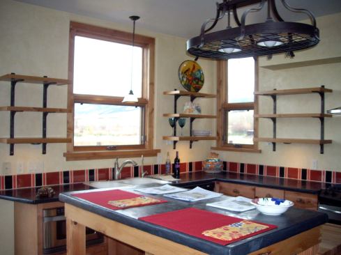 The kitchens include Energy Star-rated appliances and hand-troweled concrete countertops. The builder sent waste Sheetrock material to a local potato farmer who tilled it into the soil.