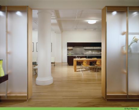 At the Light Box Loft, translucent and transparent walls frame movement and provide glimpses between rooms.