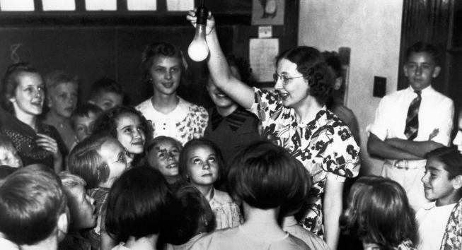 The lights come on for the first time in an unidentified schoolroom and the downtown of Shelby, Mont. Now children could study at night and were relieved of many manual chores—both of which helped kids stay in school, according to teachers from the time. Electricity also brought people together at schools, stores, and churches after working hours. Lights redefined “downtown” in small communities.