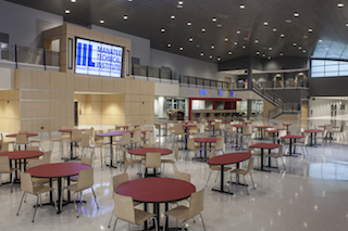 Chicago Metallic's ceiling system maximizes the height of the lobby space, follows the curve of the roofline and complements the overall, modern look of the building.