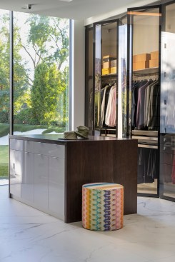 Serenity Indian Wells luxury desert mansion modern dressing room & closet with floor to ceiling glass wall & views