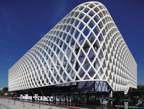 French pavilion - Jacques Ferrier Architects

Sheathed in a delicate concrete trellis, France's entry encloses a large courtyard with "growing walls" and is topped by a green roof.