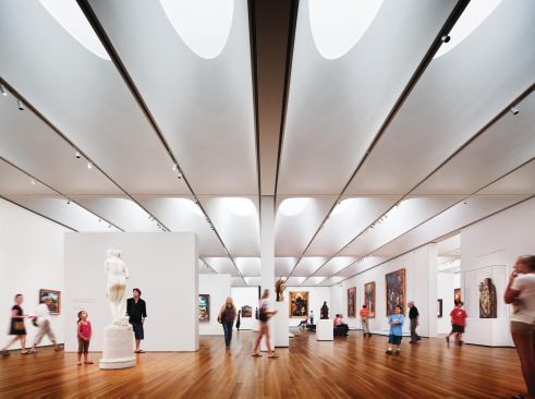 The museum features skylights with an interlayer for UV protection. The skylights have louvered domes oriented to allow only indirect north light into the galleries, and the oculi are covered in lightweight, interchangeable fabric scrims calibrated to complete the filtering process.