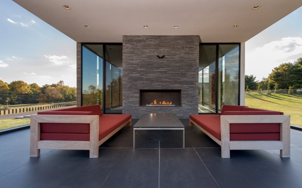 Walker Road modern family home outdoor terrace fireplace and seating