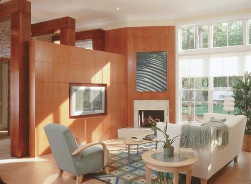 The house flows from a public front with "eyes on the street" to a private rear courtyard. Inside, the emphasis is on flexibility. Sliding walls allow the living and diningrooms to become one open space or two separate rooms.