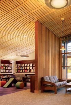 A room was set aside in the library for children's books and activities. The low slope of the roof creates an intimate environment, welcoming to Portola Valley's smaller denizens. Thick Douglas fir walls help to visually divide the space and absorb sound to prevent disturbance in the nearby main reading room.