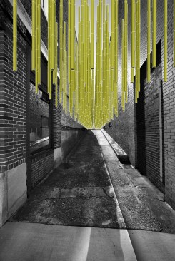 The second Chattanooga team's "Grass Garden Inversion" features bamboo poles suspended from high-tension cables spanning the buildings on each side of the alley. Passersby can engage with the poles, which move in the wind and create noise.