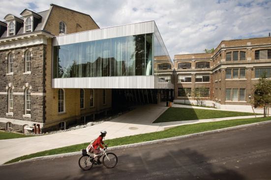 A cyclist rides past the new addition.