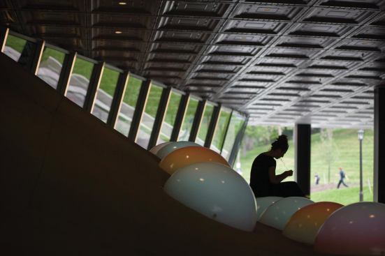 Studying with a view of Cornell's hilly campus.