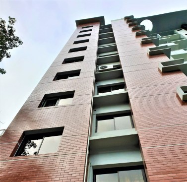 Blend with Local Brick and Painted- Plastered Wall that plays a Solid-Void harmony.