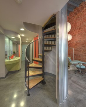 Spiral staircase leading to mezzanine