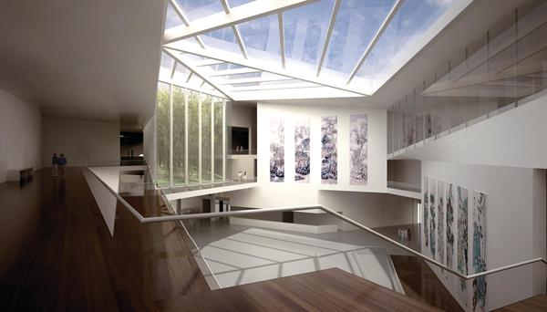 Careful to manage light and sight lines in the museum, the architects created several spaces like this one, which allows views to the outdoors and into other galleries on multiple floors, all in a daylight-flooded, multi-story space.