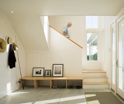 Concrete floors at the ground level reflect the owners' interest in a low-maintenance building.