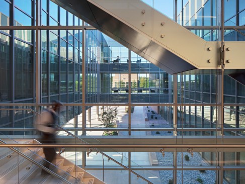 The stair overlooks the courtyard and out to the campus beyond.
