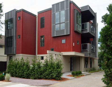 CertainTeed fiber-cement siding and Flexospan metal siding, which include 30% and 29% recycled content, respectively, offer a striking contemporary contrast to the architectural tone of the surrounding neighborhood. The building envelope includes cellulose wall insulation, Icynene spray-foam insulation in the roof, and Huber ZIP System sheathing with integrated weather-resistive barrier.