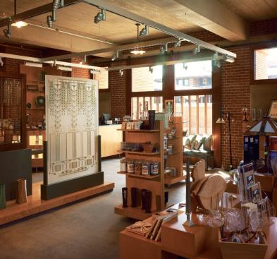 The rebuilt carriage house now houses the museum shop, and a display that shows the sheer number of glass pieces that go into one of the main house's tree-of-life windows. A back room was restored with stalls such as those that would have held the carriage horses. The ceiling was one of the few that was impossible to reconstruct from period documents, but the architects made an educated guess that board-formed conrete was the way to go.