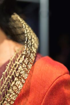 A close-up of the 3D-printed gold collar in HOK's George Washington-inspired outfit.