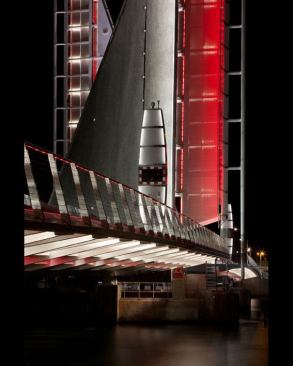 A mixture of lamp types — ­linear fluorescent, metal halide, and LED­ — were carefully chosen for each luminaire type on the bridge, and lensing and focusing strategies were designed to reduce light spill and glare. The lighting was also designed with ease of maintenance in mind.