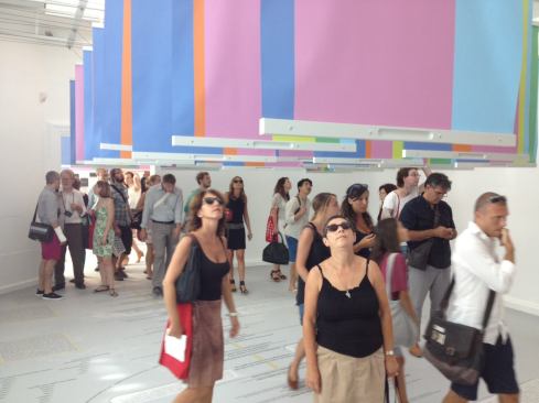 The backs of the banners feature a coded system of colored stripes that correspond to the themes present in each project.