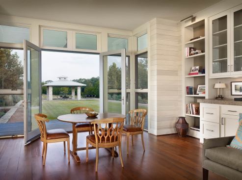 Poplar shiplap paneling lines the walls throughout.