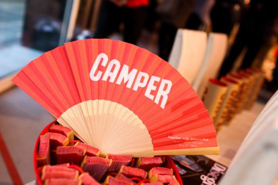 Fans sporting the Camper logo were given out at the opening party.